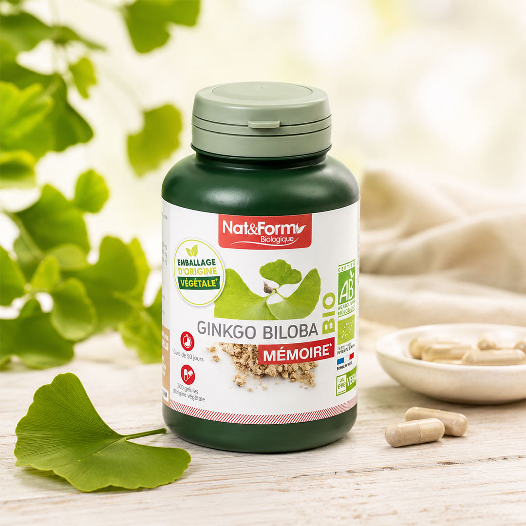 Bottle of Nat&Form Ginkgo Biloba supplement with green leaves in the background