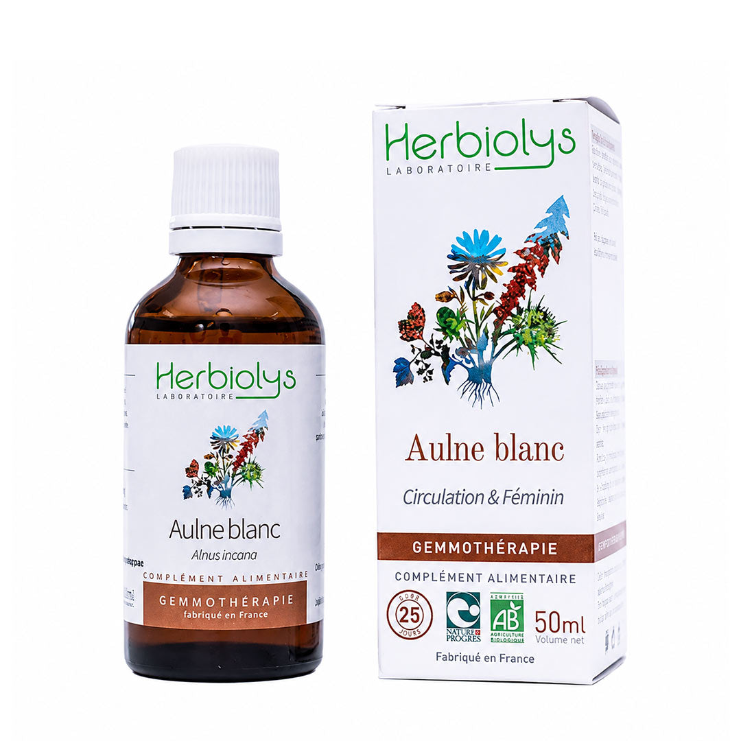 A bottle and box of Herbiolys Laboratoires Aulne blanc gemmotherapy supplement, featuring an amber glass bottle with a white cap and a white box with colorful botanical illustrations.