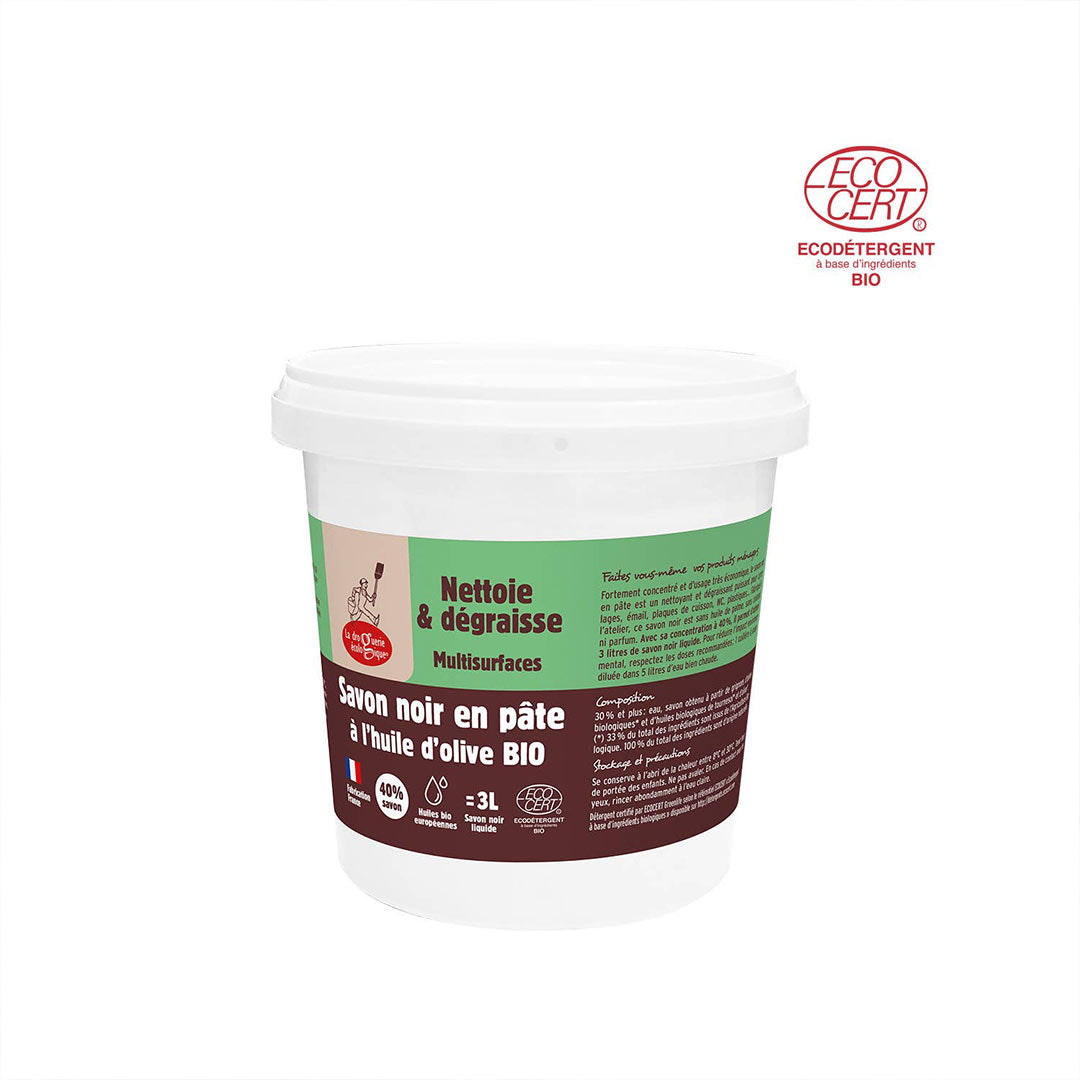 A 1kg white plastic tub of Bio Nettoie & dégraisse Multisurfaces soap on a white background, featuring a green and dark brown label, with an EcoCert organic certification logo in the top right corner.