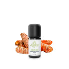 A 5 ml bottle of Turmeric Curcuma Frais essential oil with a black cap and white label, set against a background of fresh turmeric roots.